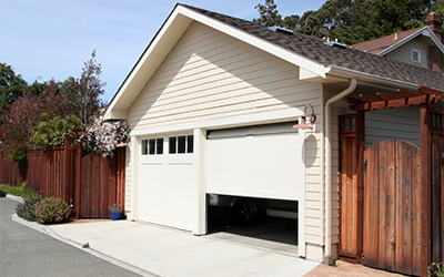 The Hidden Dangers of Forcing an Overhead Door to Open